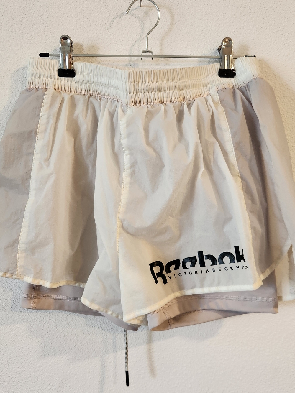 Reebok Women's Cream Layered Athletic Shorts with Logo